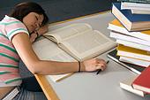 42-15556099 - Student Sleeping in Library