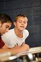 42-15725260 - High School Boy Cheating off his Neighbor's Test