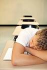 42-15725531 - Teenage Boy Sleeping in Class